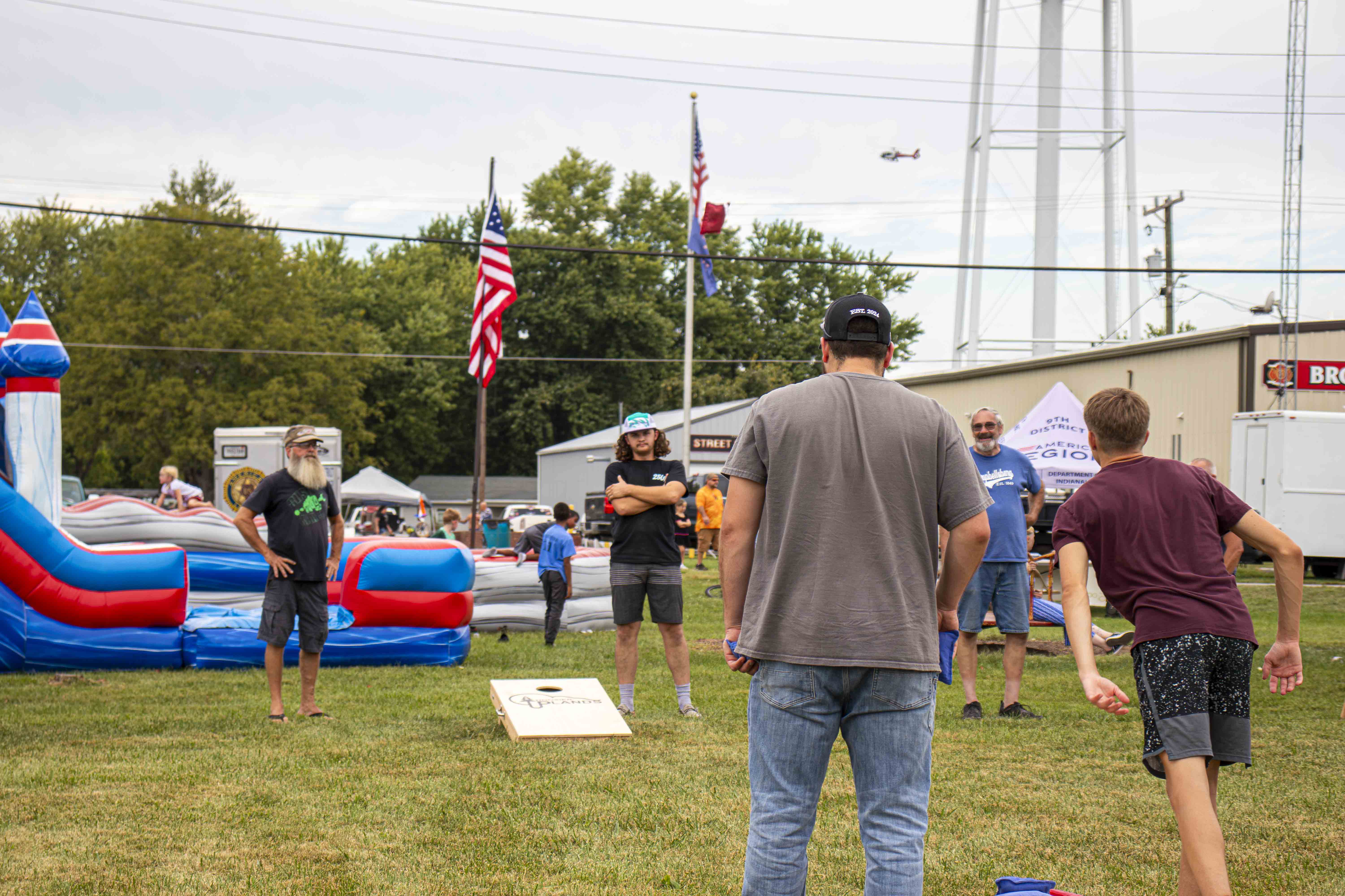 Attendees playing cornhole.